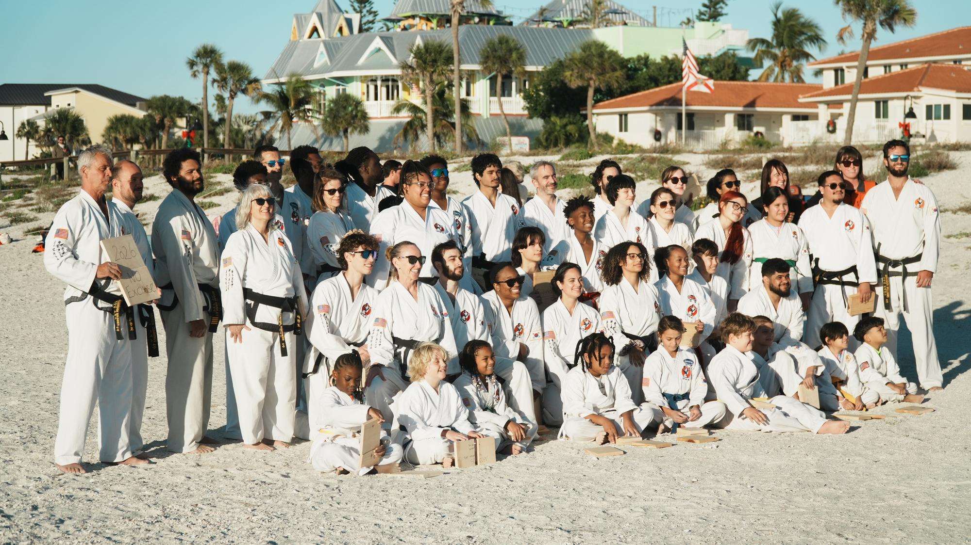 Students of Traditional TaeKwon-Do Center of South Tampa gathered on the beach